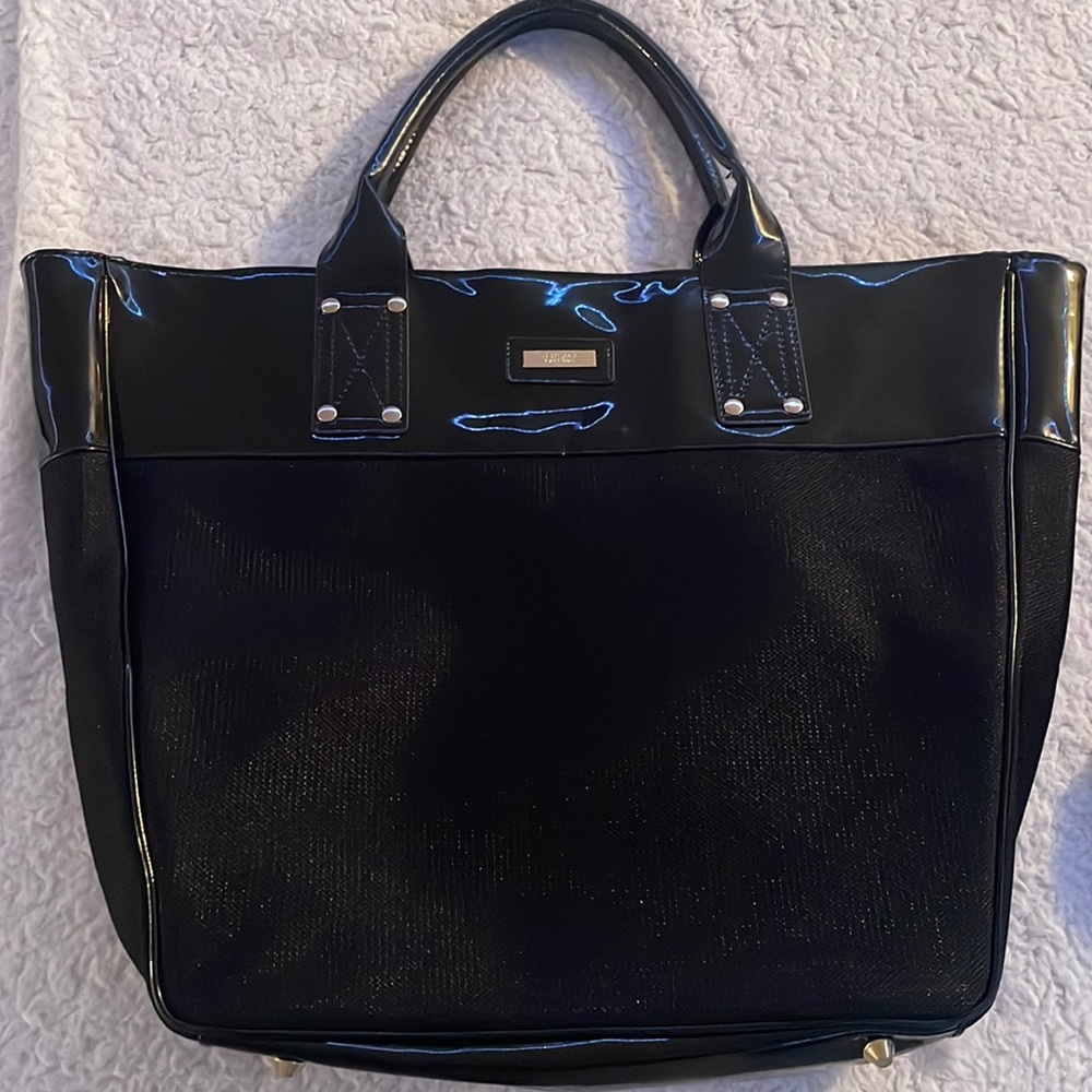 Large black tote bag. Never used.